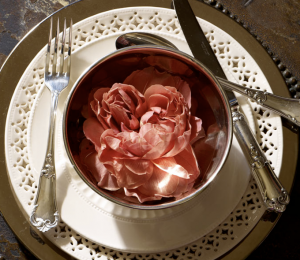 Dinner setting with peony in bowl.png